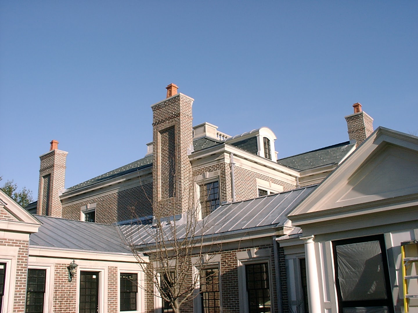 L C Masonry - Professional chimney cleaning and repair services in Bedford, Massachusetts